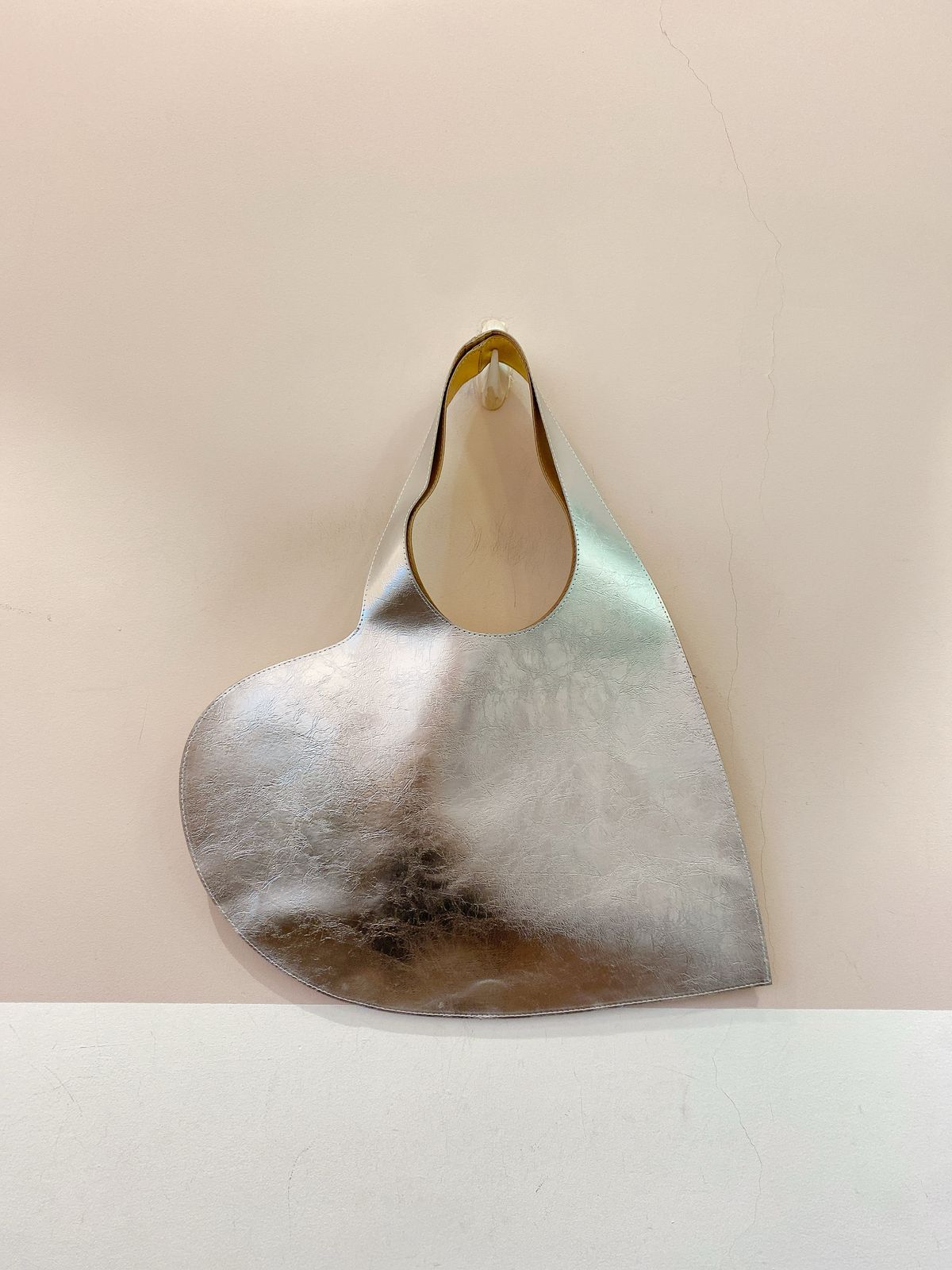 Bolsa metálica coração