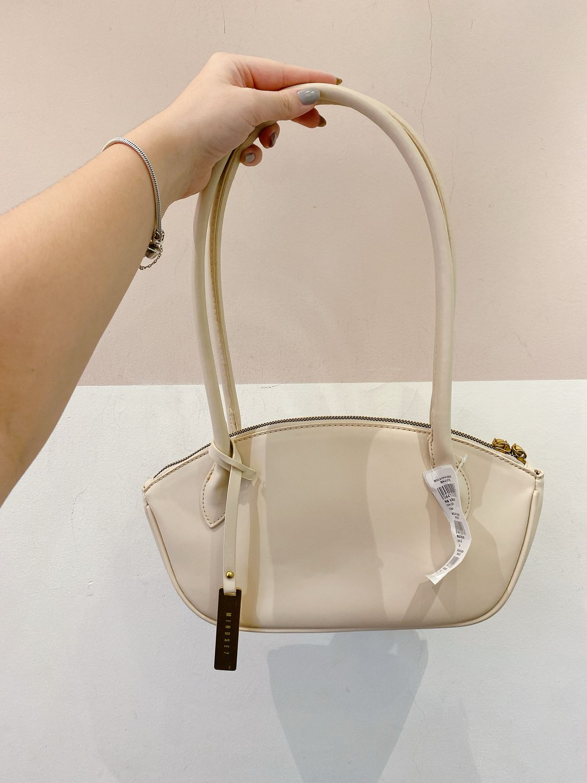 Bolsinha bege baguete C&A