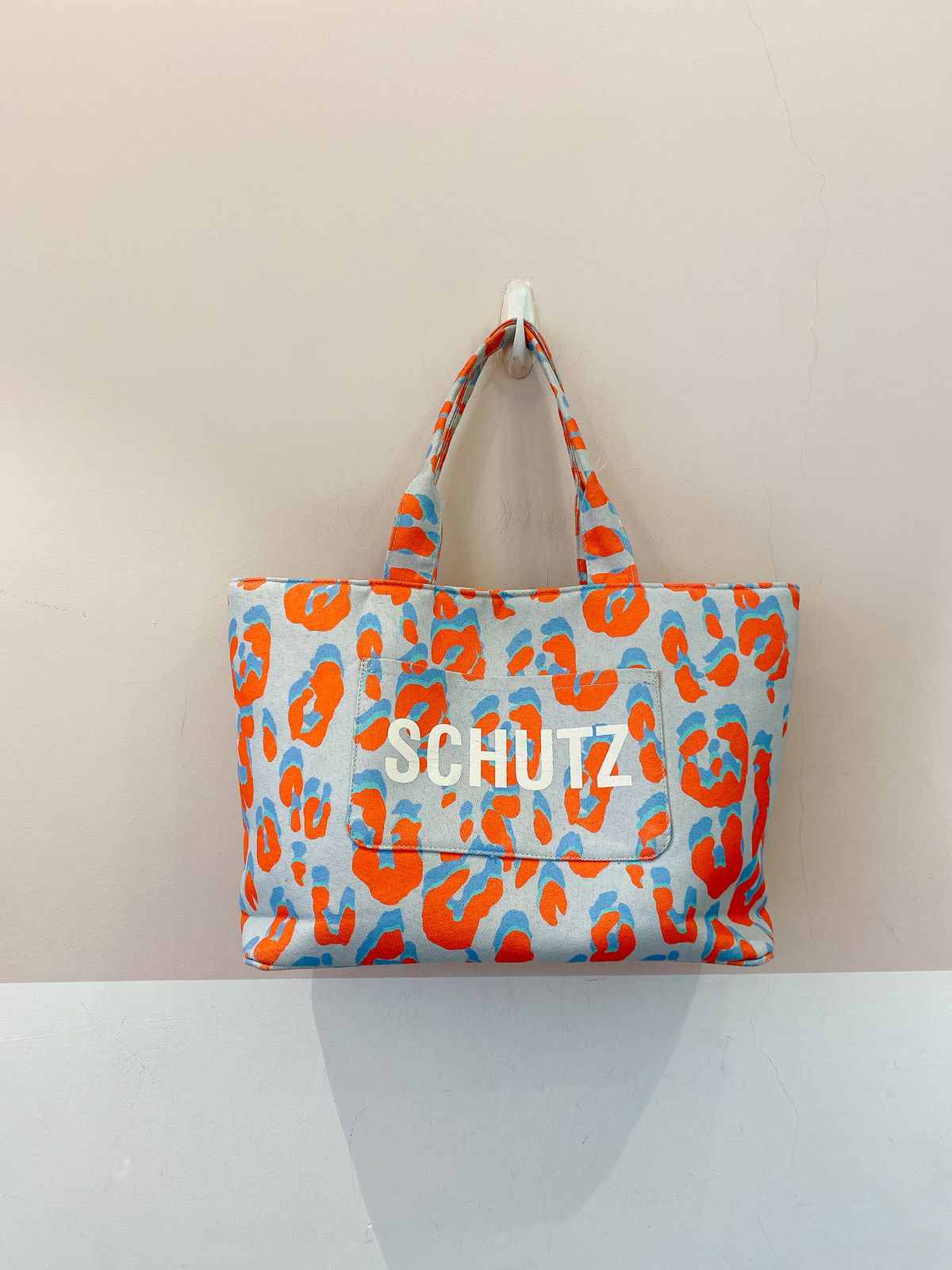 Bolsa tecido azul oncinha Schutz