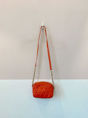 Bolsa tiracolo matelassê laranja Schutz