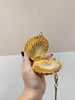 Bolsinha dourada concha