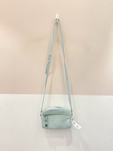 Bolsinha tiracolo verde-água Schutz