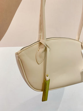 Bolsinha bege baguete C&A