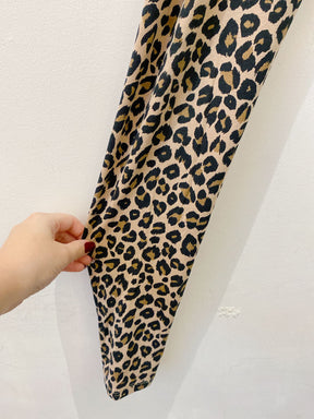 Calça malha onça Kiabi P